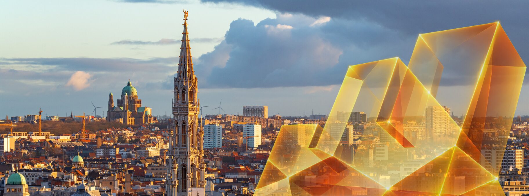 Grand Place_Effie visual_gem A panoramic view of Brussels at sunset, featuring the Brussels Town Hall and the Basilica of the Sacred Heart in the distance. The skyline is overlaid with a stylised version of the Effie logo, resembling a jewel.